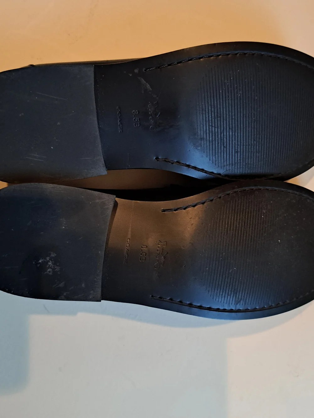 Coach Black Leather Women's Loafers with Gold Accent